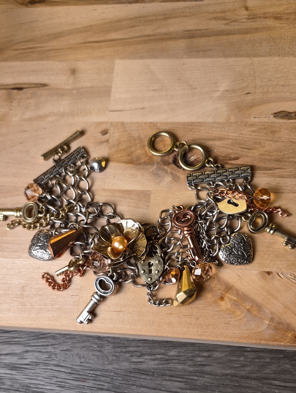 Vintage-Inspired Charm Bracelet with Gold and Bronze Accents